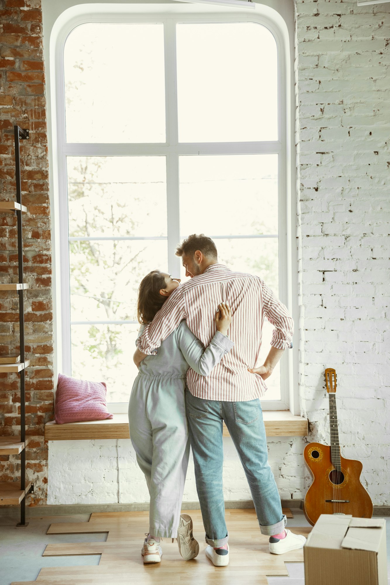 Young couple moved to a new house or apartment